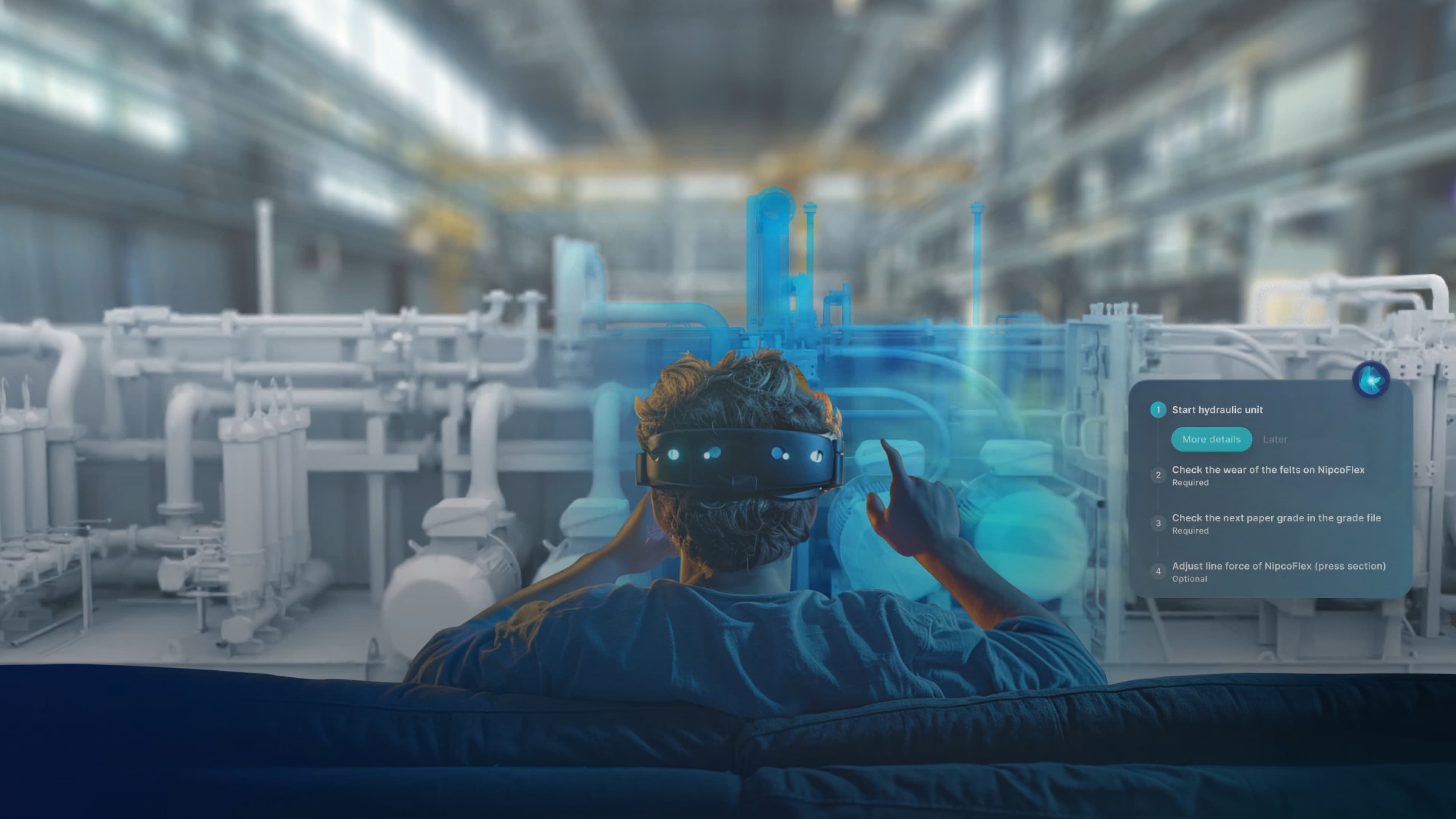 Person using a VR headset to interact with a digital twin of an industrial facility in a smart factory environment.